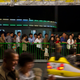 Pyongyang residents playing bumper carts.